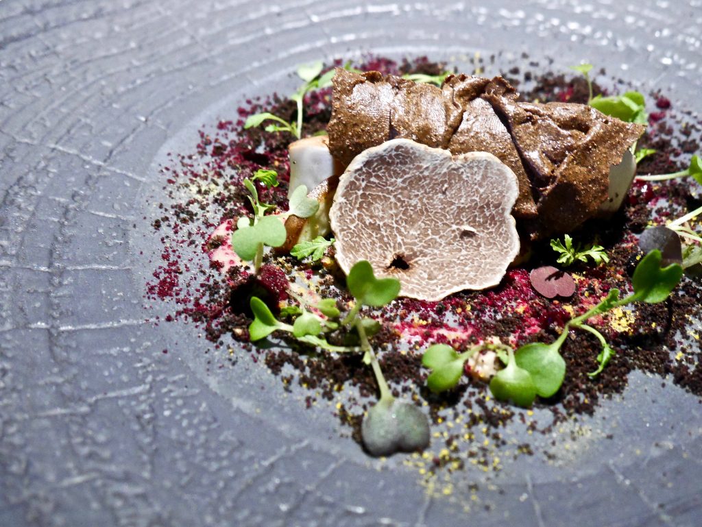 forest dish of mushroom, beet and blackberry, scented with fig leaf, meadowsweet, oakmoss and black truffle