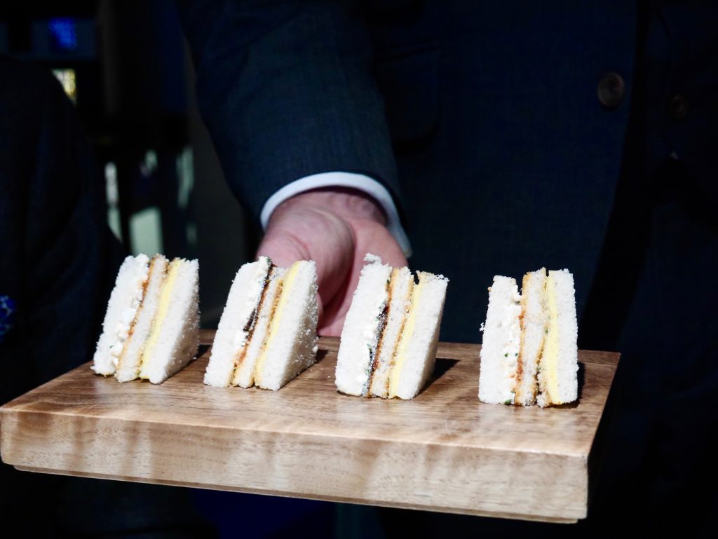 4 egg toast sandwich on a chopping board