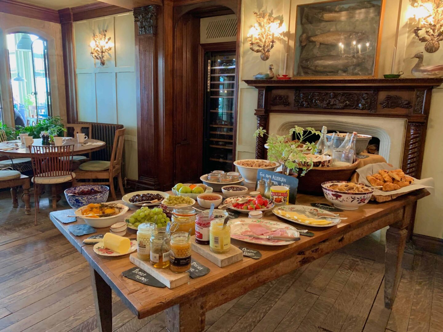 breakfast spread on a table in front of a fire place
