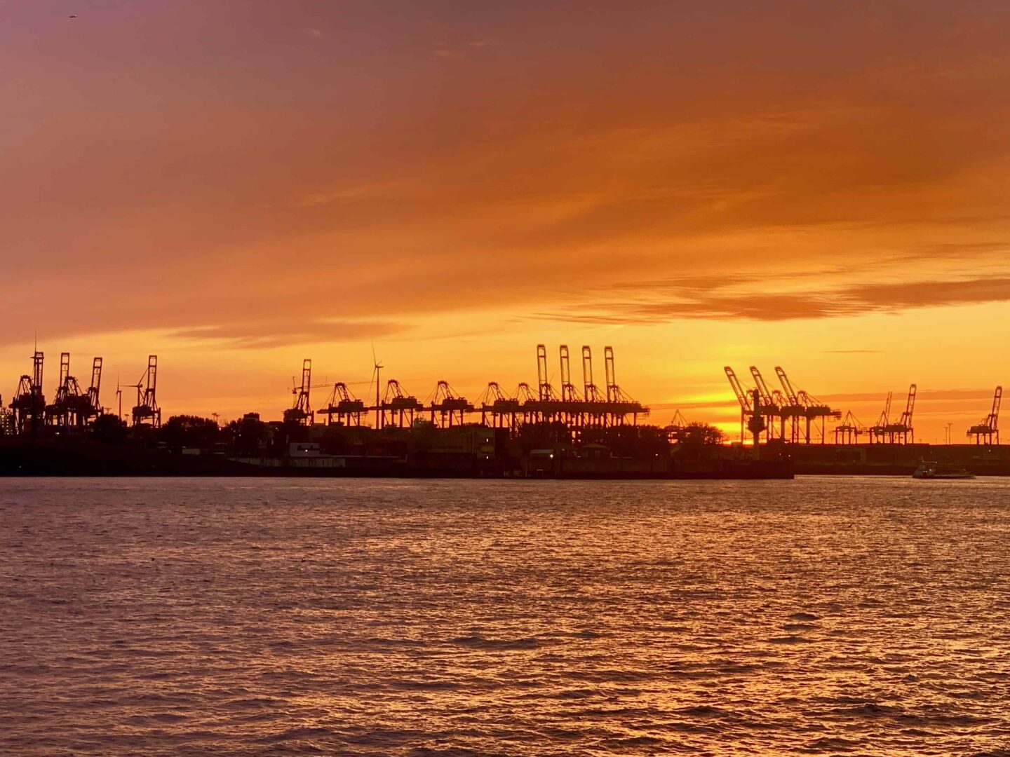 picture of sun setting looking over to the port
