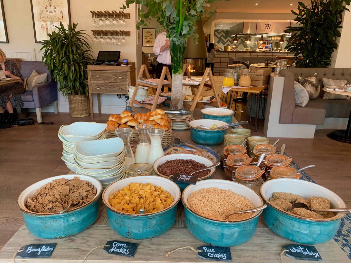 view of the breakfast offerings in hook restaurant buffet style help yourself in blue jars