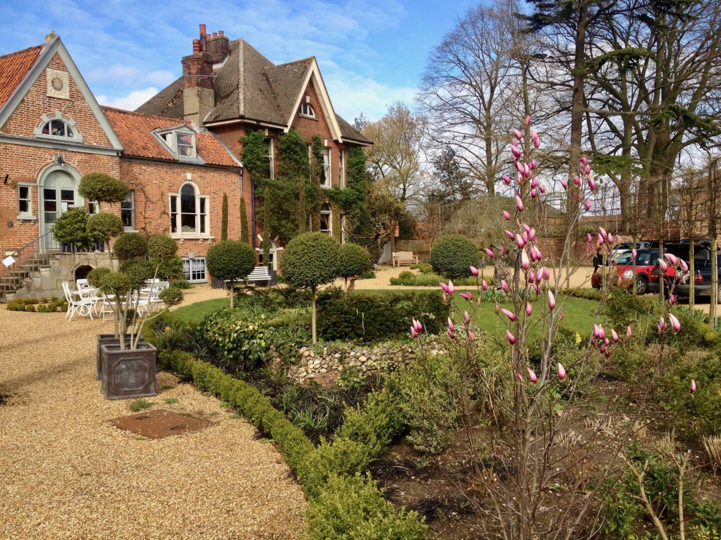 image of the gardens outside the front of strattons luxury hotel
