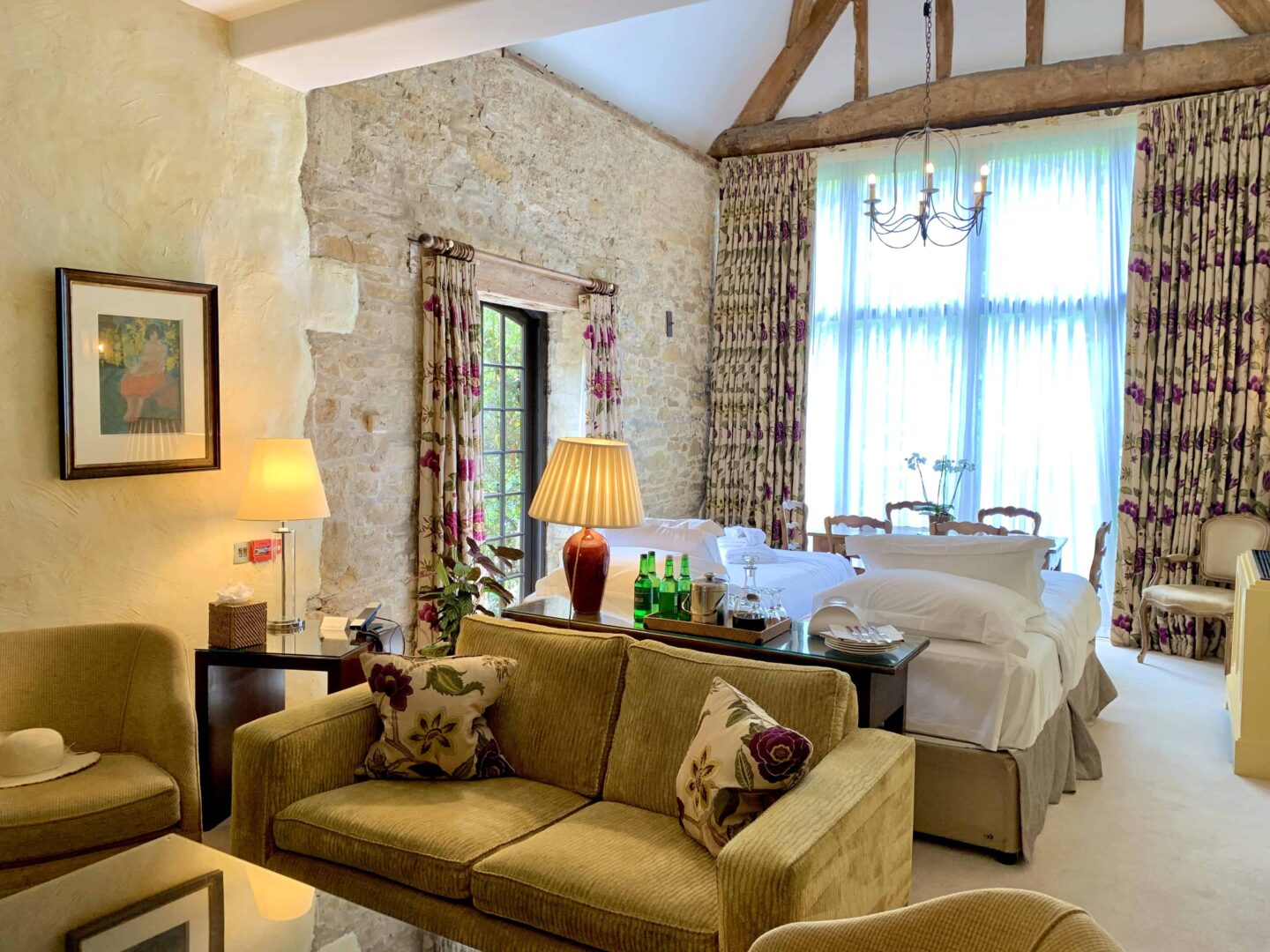 view of the wooden beams, brick walls, living area