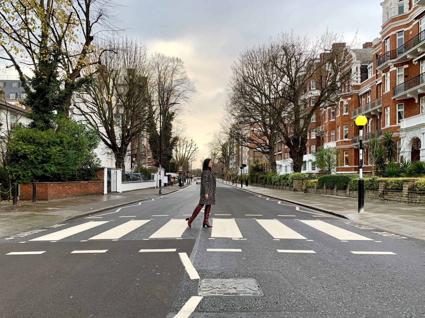 sima walking across the zebra crossing at abbey road studios