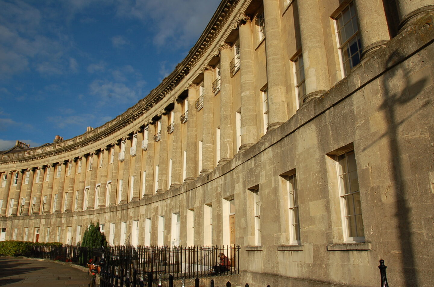 Sweeping view of the Royal Crescent in Bath, a key location in Bridgerton.