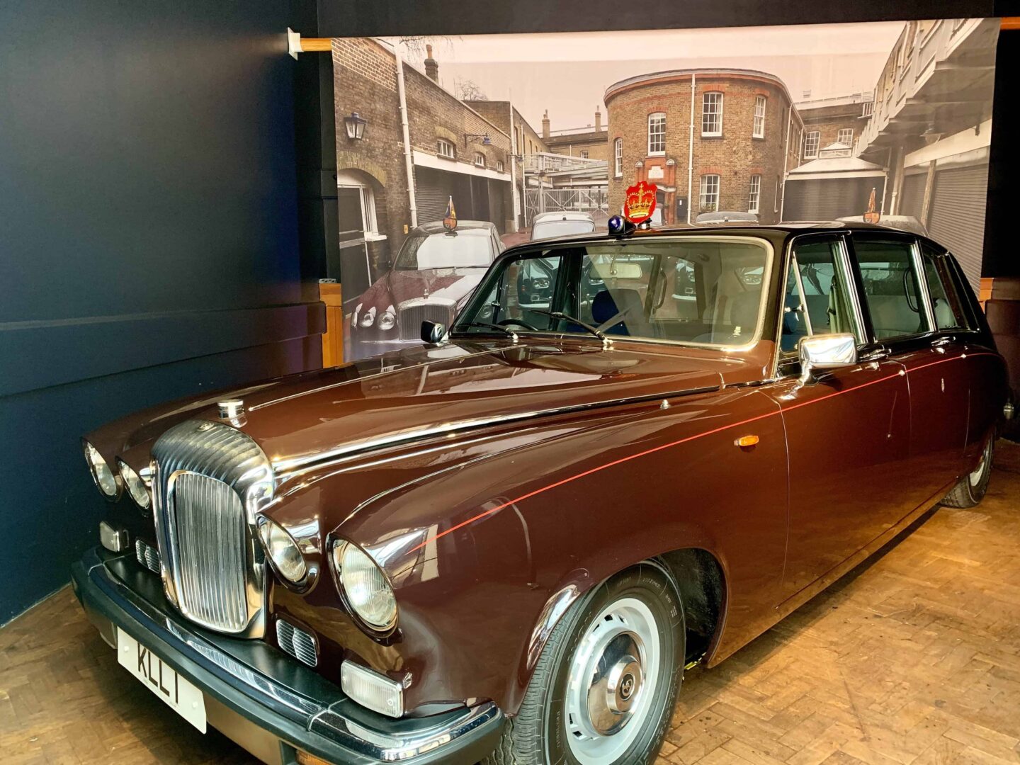 red Rolls Royce Phantom IV with HRH red crown sign on the top