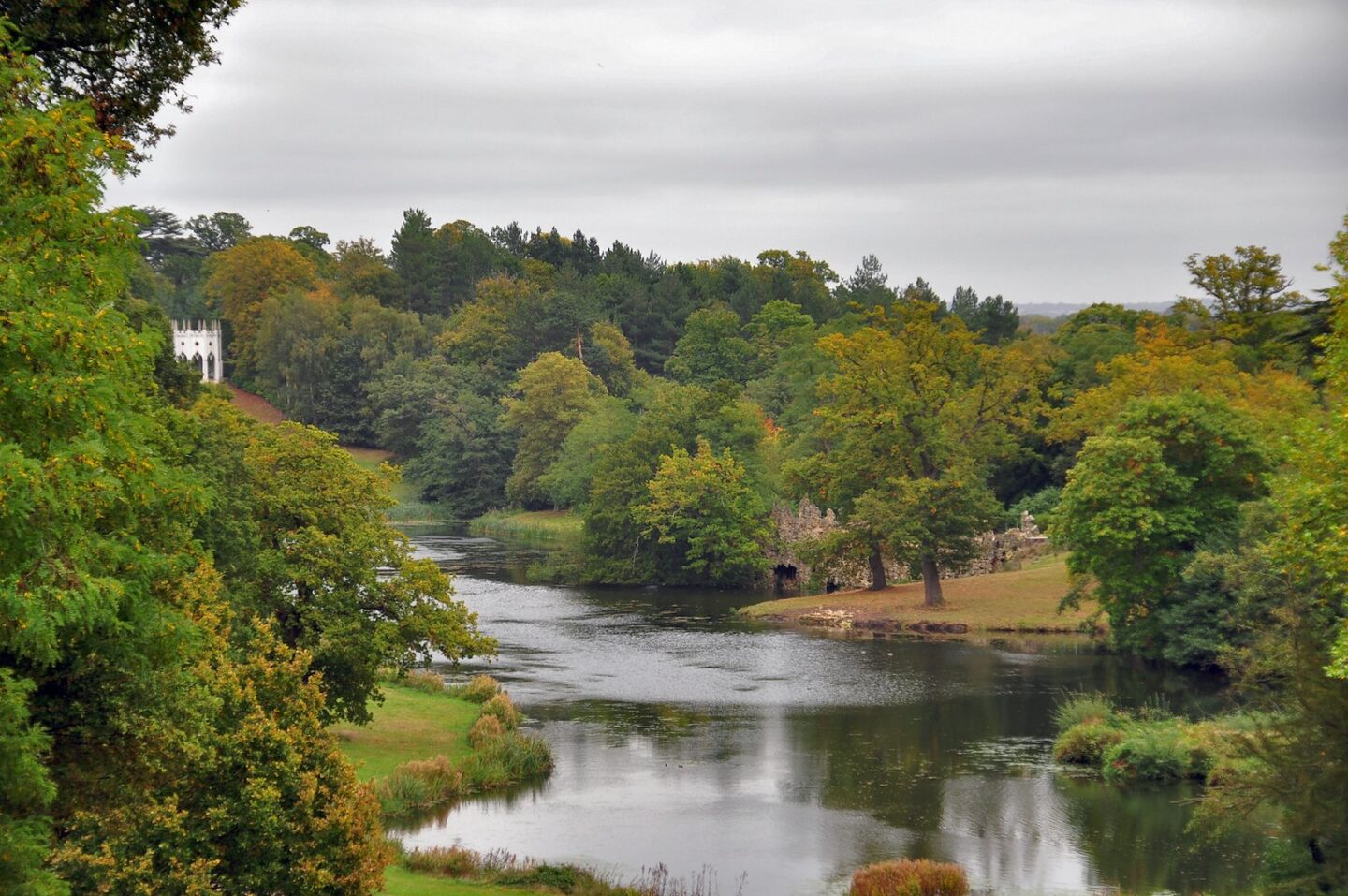 Painshill Park in Surrey with the lake and ruins in view.
